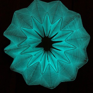 Teal glowing star shape