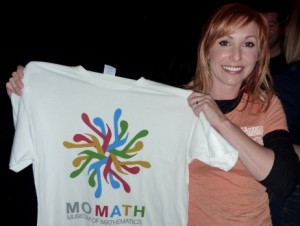 Kari Byron of MythBusters showing off a MoMath T-shirt (available at momath.org/shop).